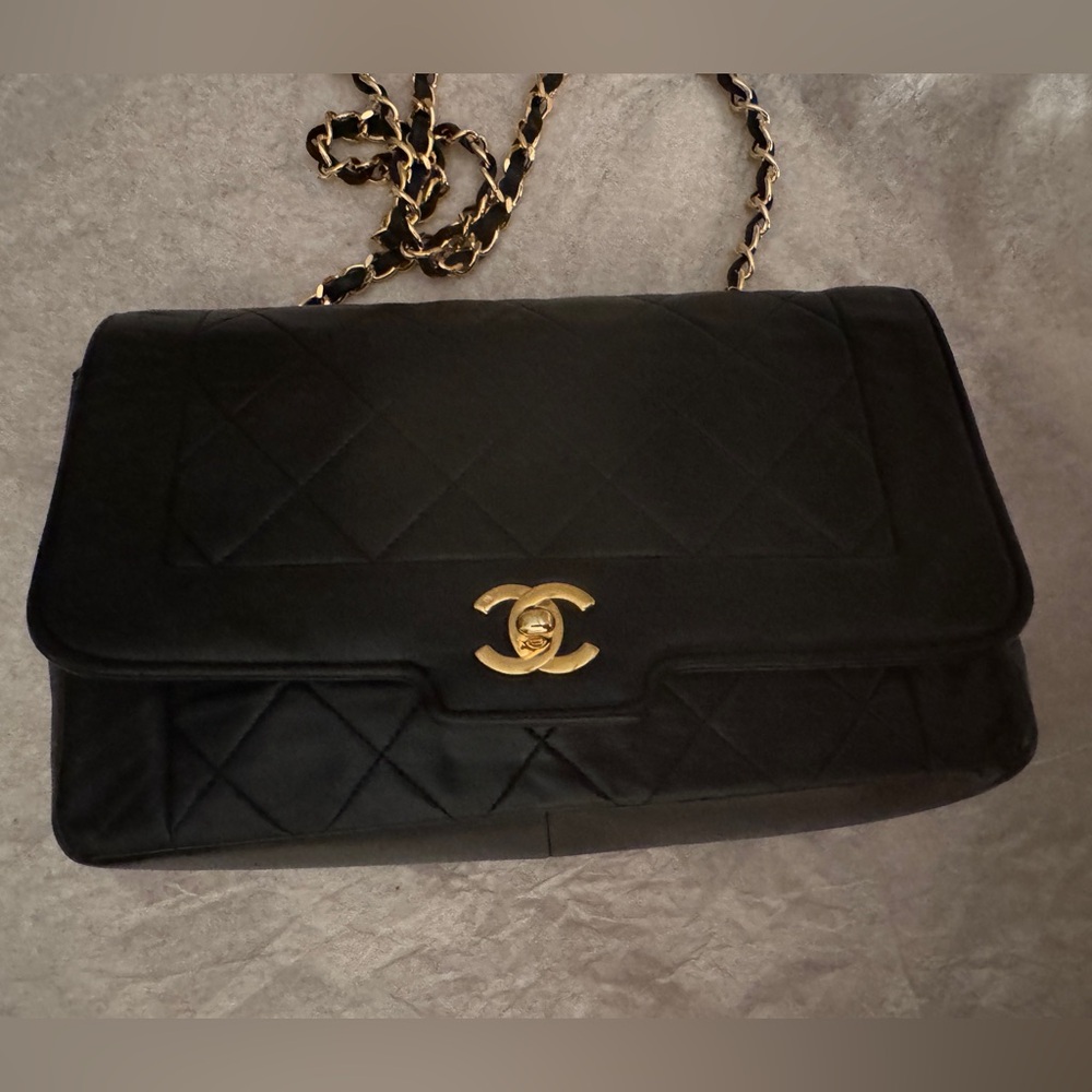 CHANEL Classic Black Quilted Bag with Gold Accent